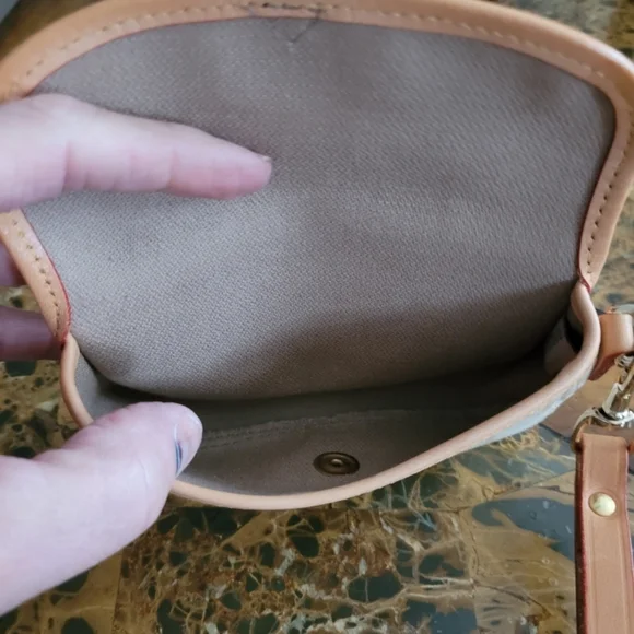 Dooney and Bourke Elegant Cream and Tan Women's pouch - Picture 4 of 4
